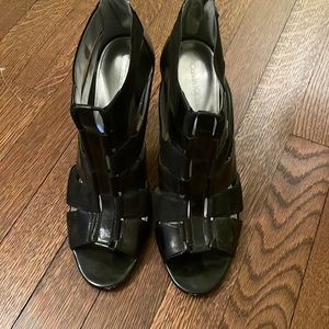 Calvin Klein high heeled open toed shoes.